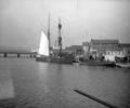 Unknown sailing vessel and steam tug