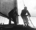 Two men on sailing boat