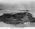 Aerial view of Brownsea Island with Sandbanks behind