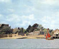 Sailing dinghy in front of Brownsea Castle
