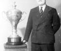 Unidentified man with trophy