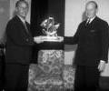 Unidentified men with trophy